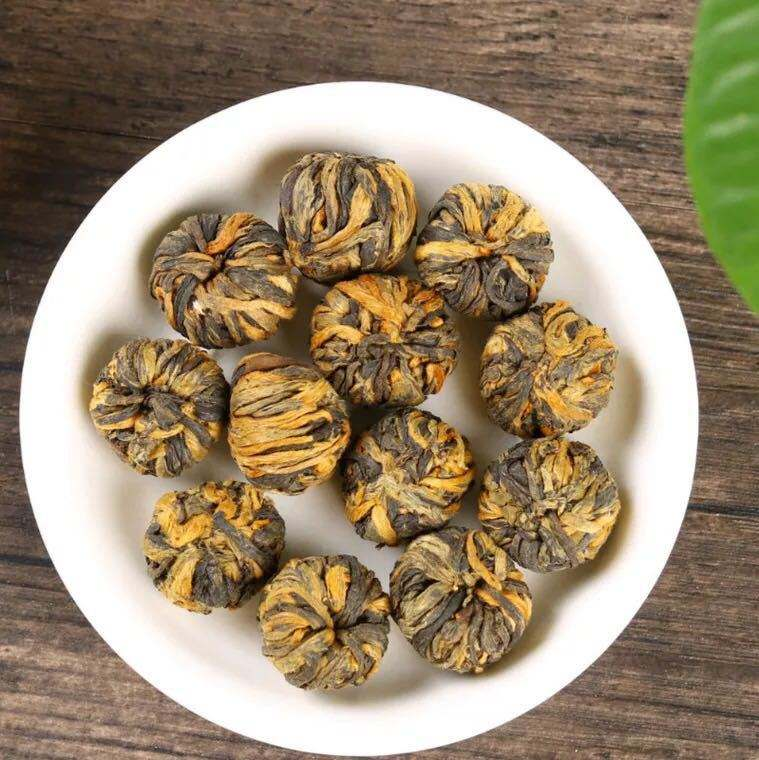 Bulk Hand‑Twisted Black Dragon Ball Black Tea | Yunnan Handmade Blooming Tea OEM ODM Private Label Supplier